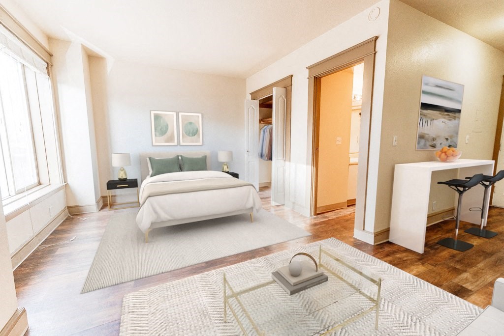 a bedroom with a bed and a rug at Zindorf, Seattle, WA