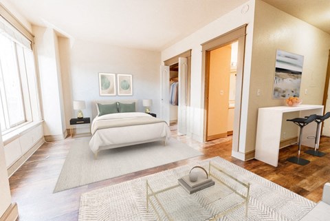 a bedroom with a bed and a rug at Zindorf, Seattle, WA