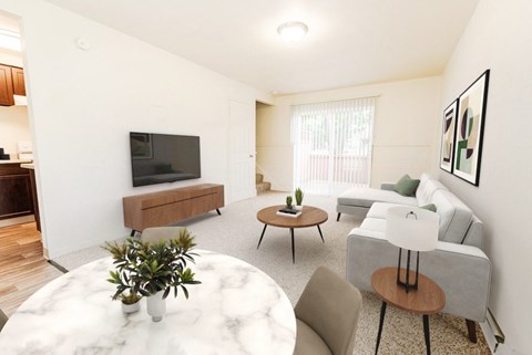 a living room with a couch and a table