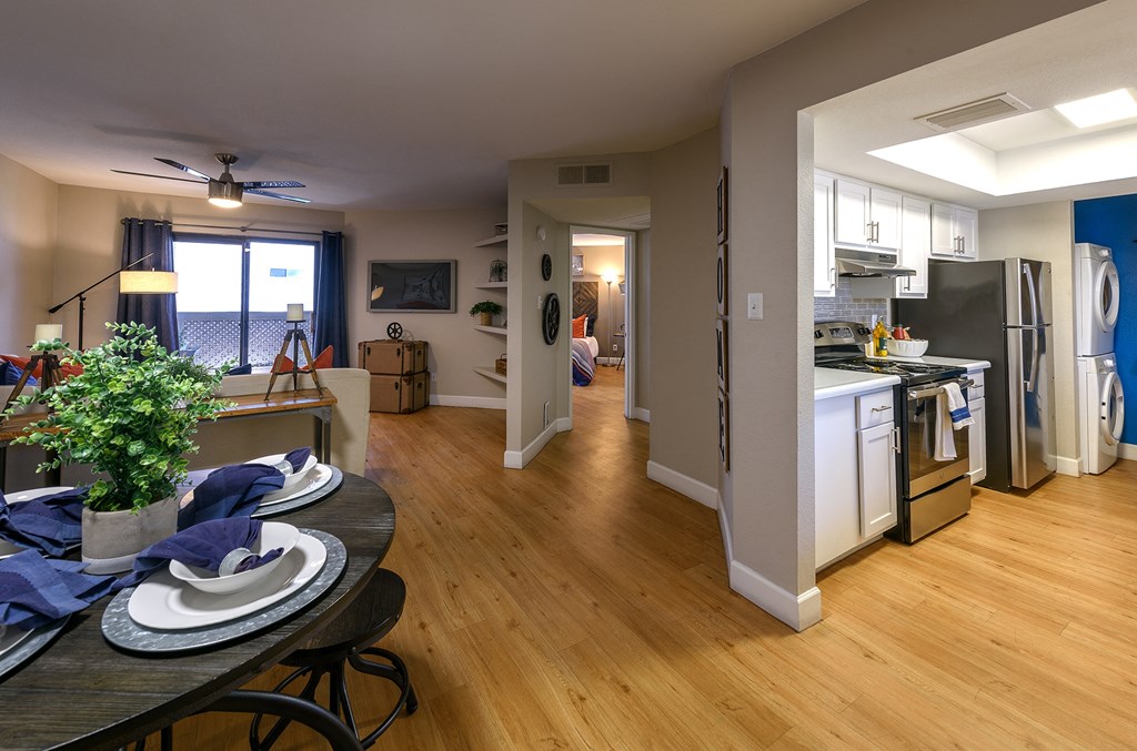Peoria Apartments- Moxi Apartments-  a view of a kitchen and living room from the dining room