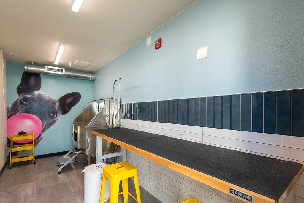 a mural of a pig on the wall of a kitchen