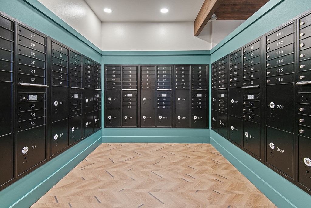 a large locker room with a bunch of lockers in it