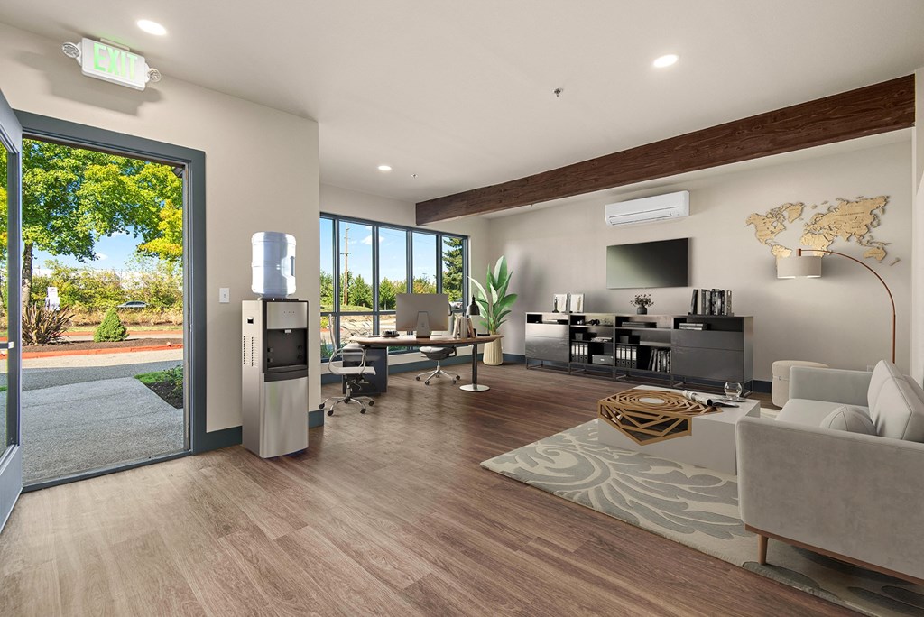 a living room with a couch and a chair and a tv