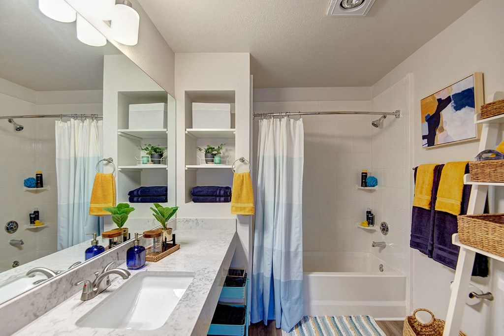 Kent Apartments- Astral Apartments- bathroom- shower- sink- cozy
