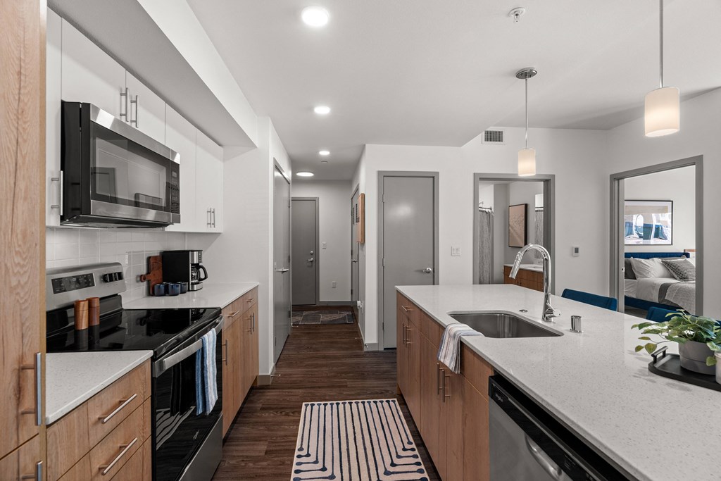 a kitchen with a large counter top and a sink at Gage On Sixth, Washington, 98406