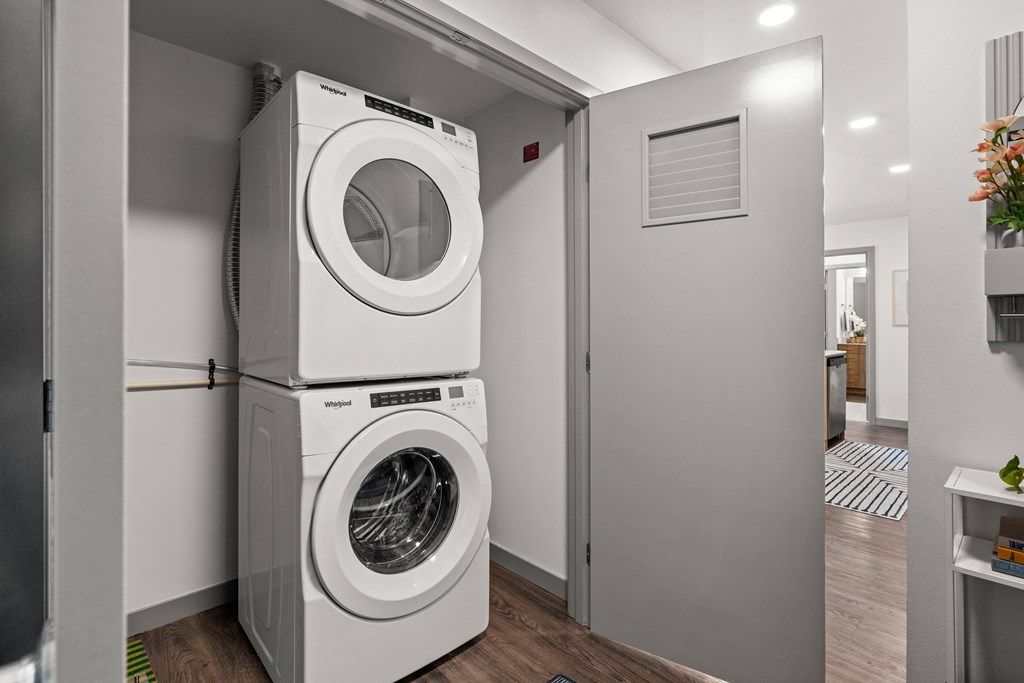 a front loading washer and dryer in a laundry room at Gage On Sixth, Tacoma, WA