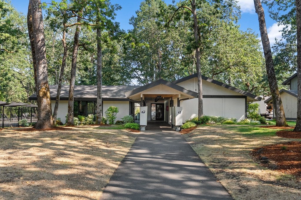 A house with a driveway in front of it.