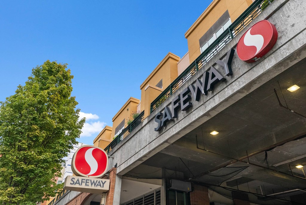 Safeway store sign on a building.