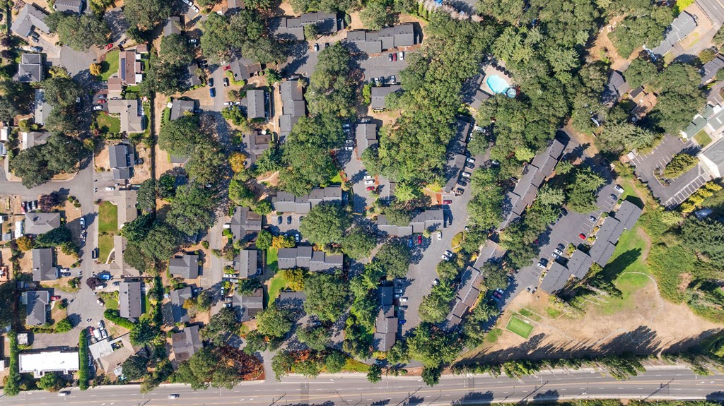 A residential area with houses and trees.