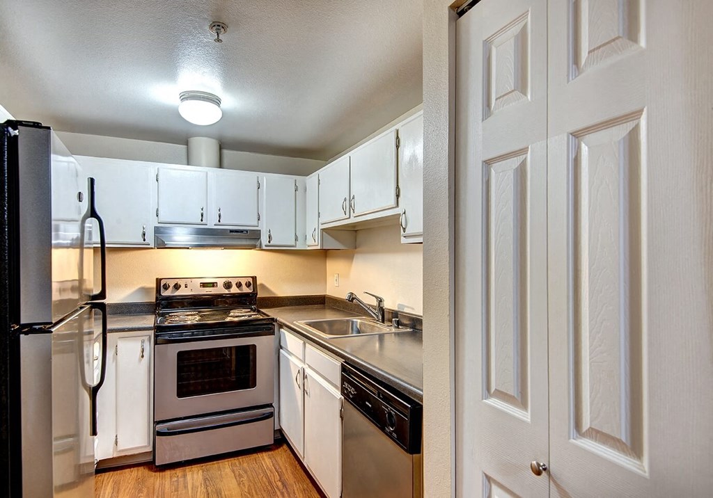 Kitchen with cabinets at Ellis Court Apartments, Seattle, 98121