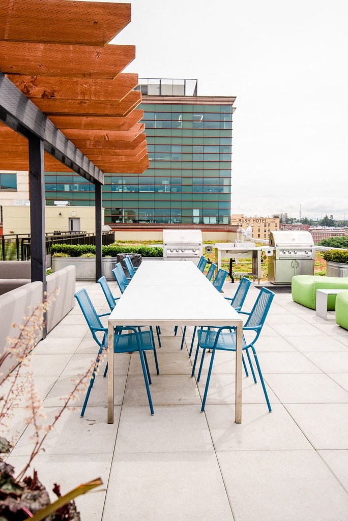 Apartments in Seattle, WA - Icon Apartments Rooftop Deck with BBQs and City Views