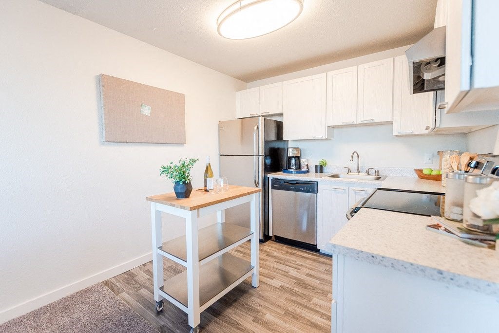 kitchen with white interior at ReVive Apartments, Washington, 98424