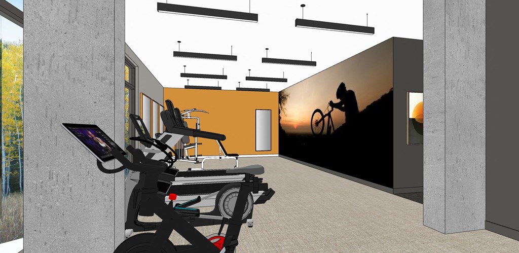 a hospital room with a patient on a bike and a wheelchair