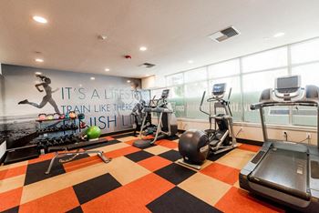 A gym with treadmills and equipment at The Platform, Kent, WA, 98032