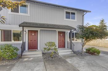 A house with a red door and a grey roof. at The Retreat, Sumner, WA, 98390