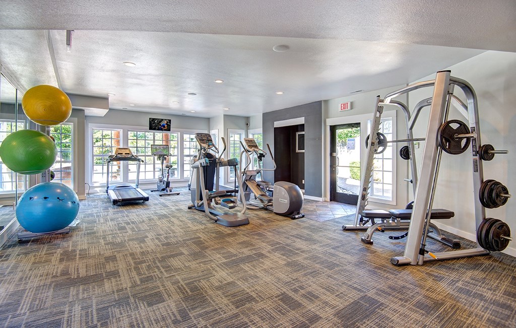 Fitness center at Deer Creek Apartments, Puyallup, WA, 98373