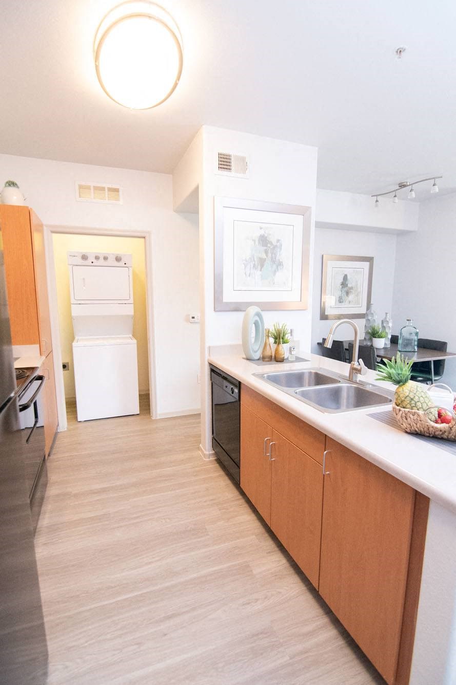 West Valley Phoenix Apartments for Rent - West Town Court Apartments - Kitchen with Quartz Counter Tops and Black Electric Appliances