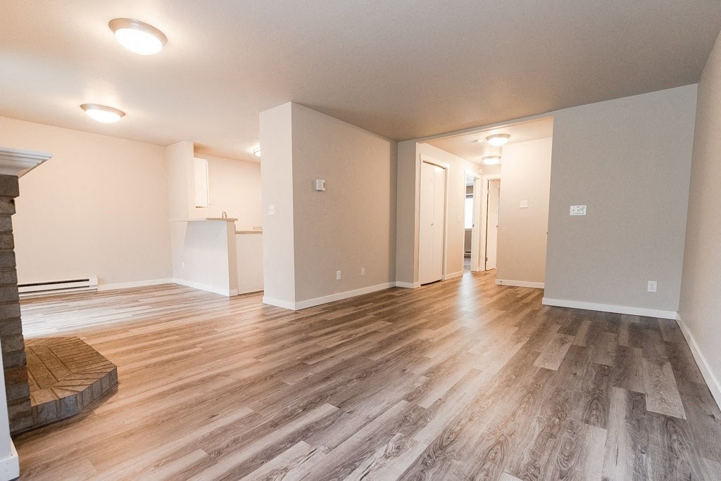 Living Room, Fireplace, Dining Room, Kitchen, and Entryway at Cambridge on Seventh, Puyallup