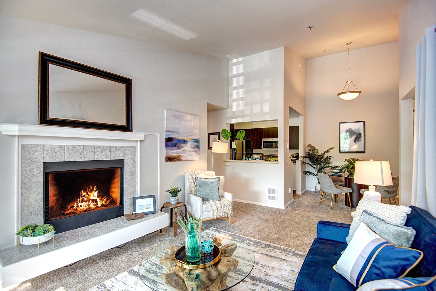 a living room with a fireplace and a couch