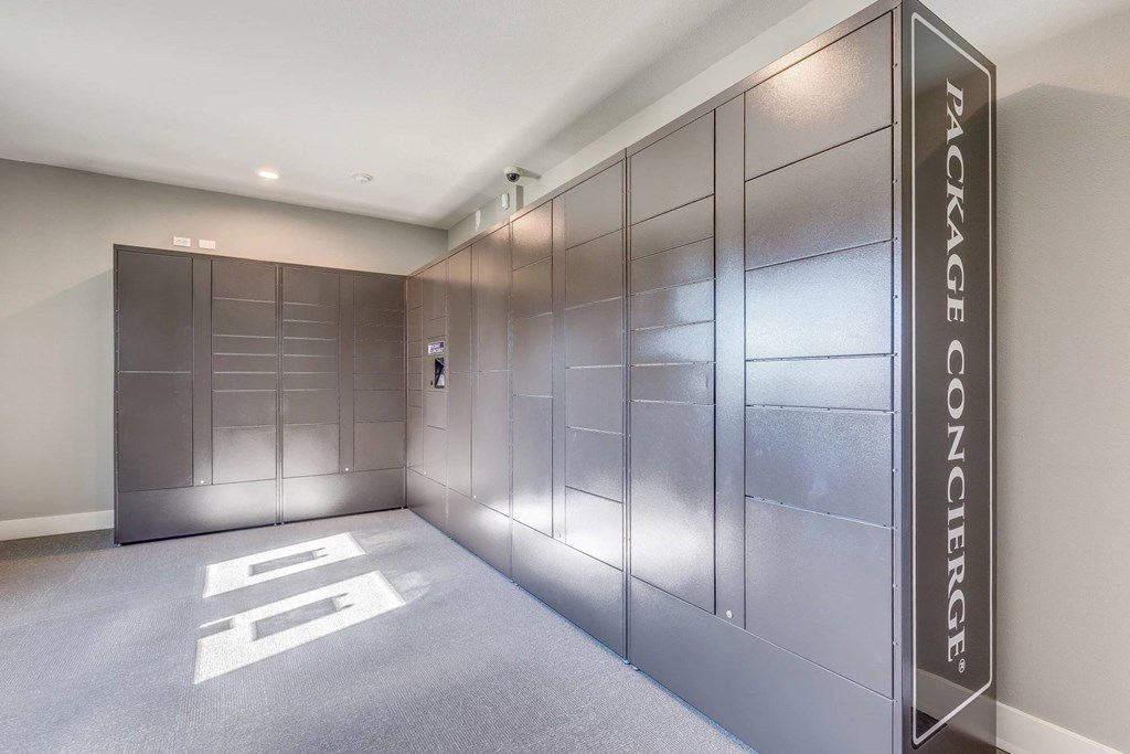 A hallway with a sign that says Package Concierge.