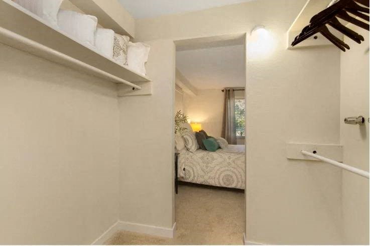 A small bedroom with a bed and a window. at The Retreat, Sumner, Washington