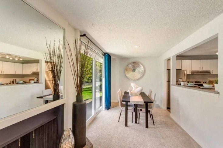 A dining room with a table set for four. at The Retreat, Washington
