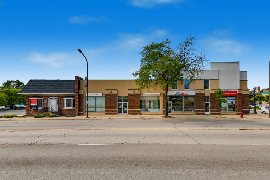 a building on the corner of a street
