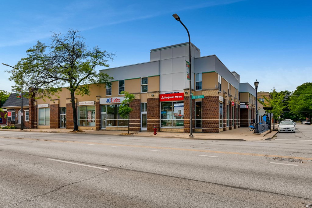 a building on the corner of a street