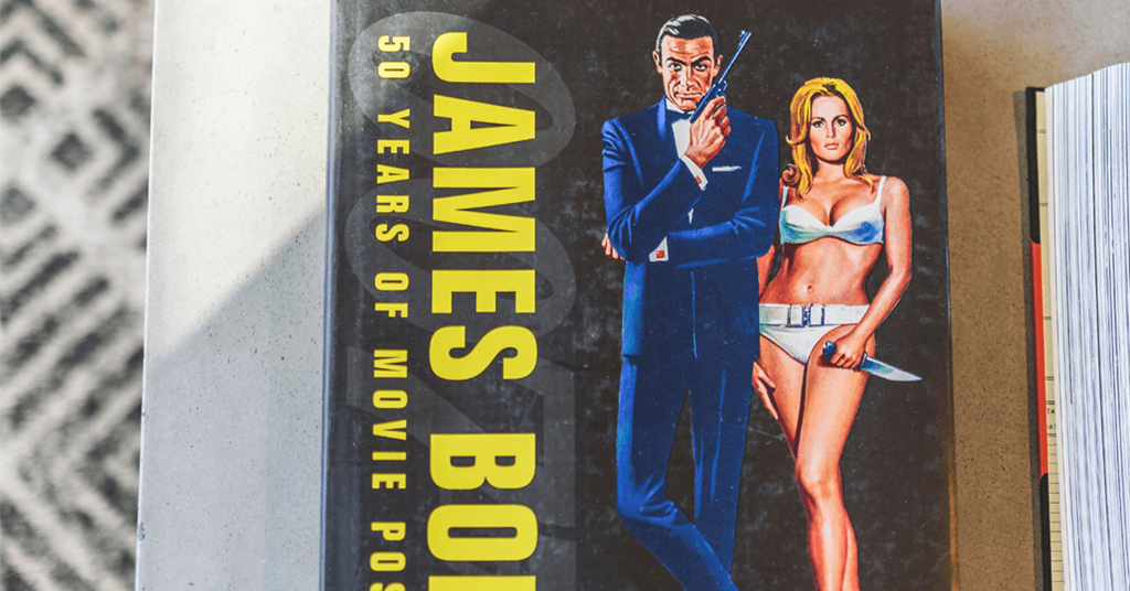 a comic book with a man in a blue suit and a woman in a bikini
