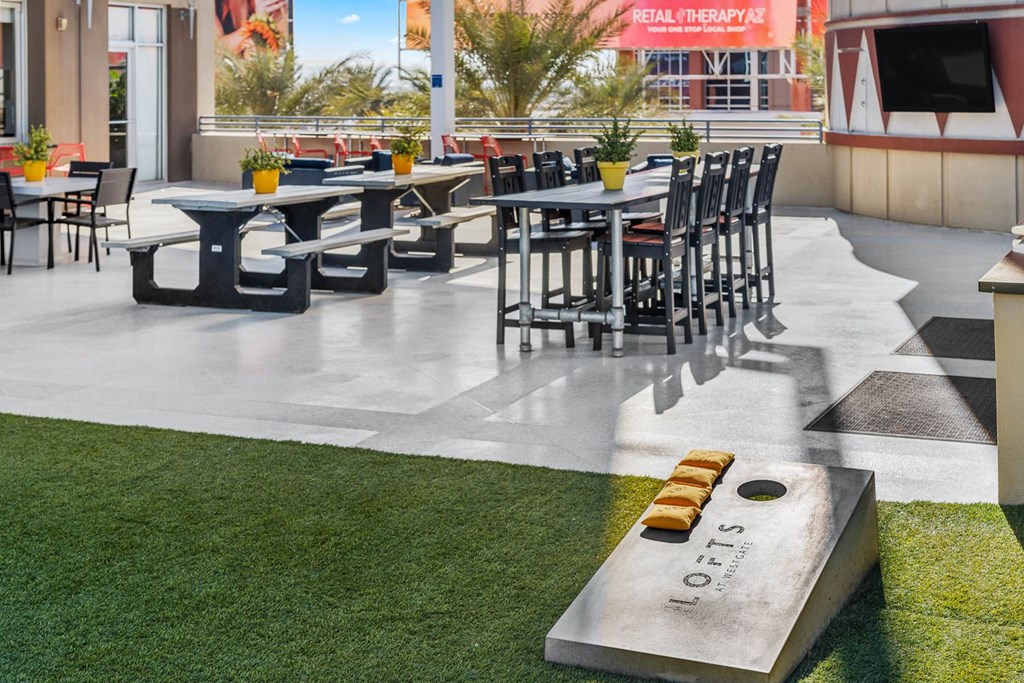 A large outdoor dining area with tables and chairs.