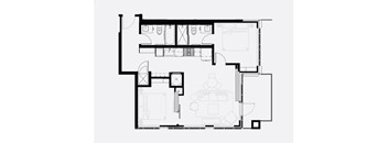 A black and white floor plan of a house with a kitchen, living room, and bathrooms.
