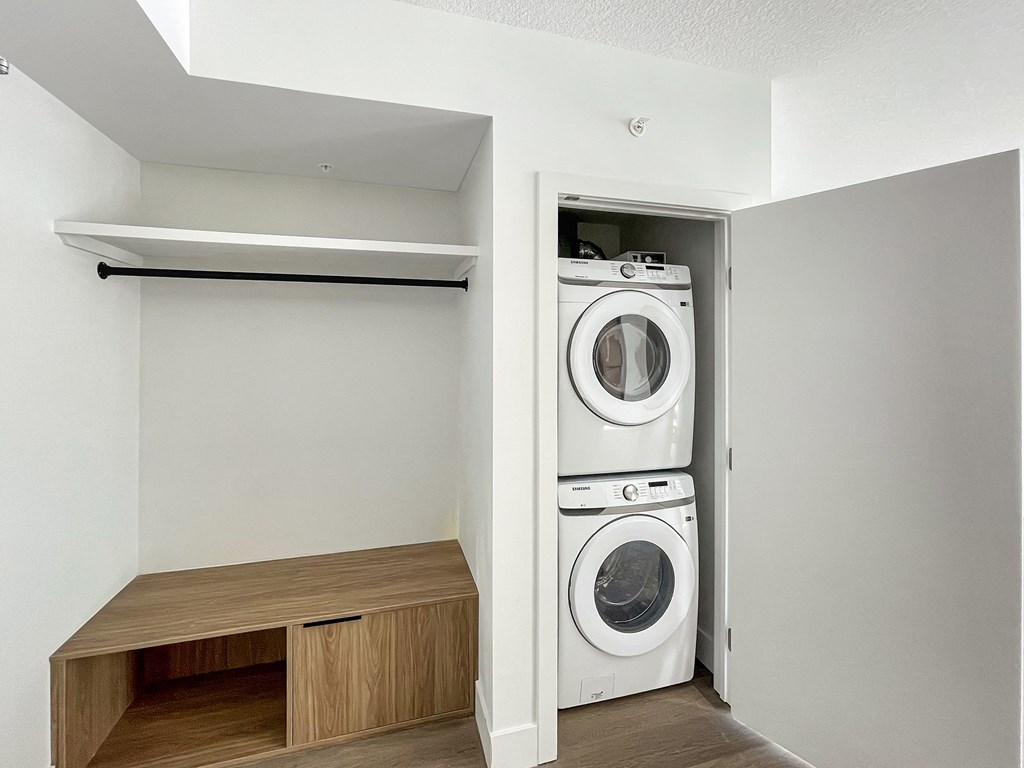 a small laundry room with a washer and dryer in a closet