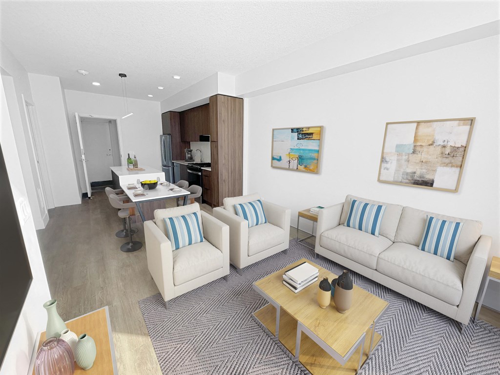 a living room with couches and chairs and a table