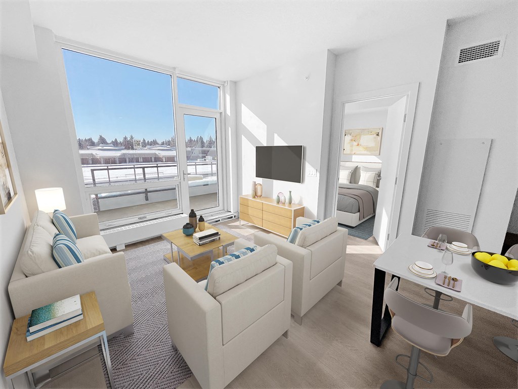 a living room with white furniture and a view of a bedroom