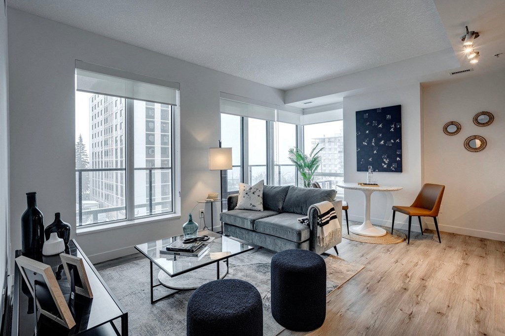 Large Living Room With Ceramic Tile Flooring at Citizen on Jasper, Edmonton, Alberta