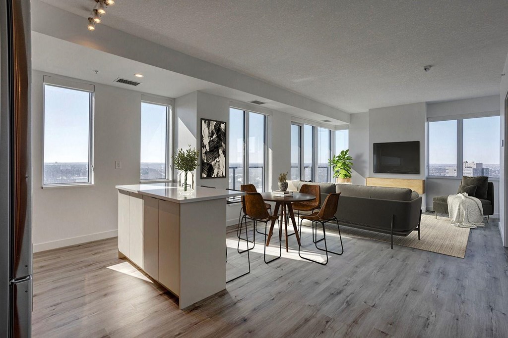 a kitchen and living room in an apartment  at Citizen on Jasper, Alberta