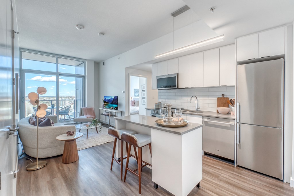Fitted Kitchen With Island Dining at BLVD Beltline, Alberta, T2G 2K4