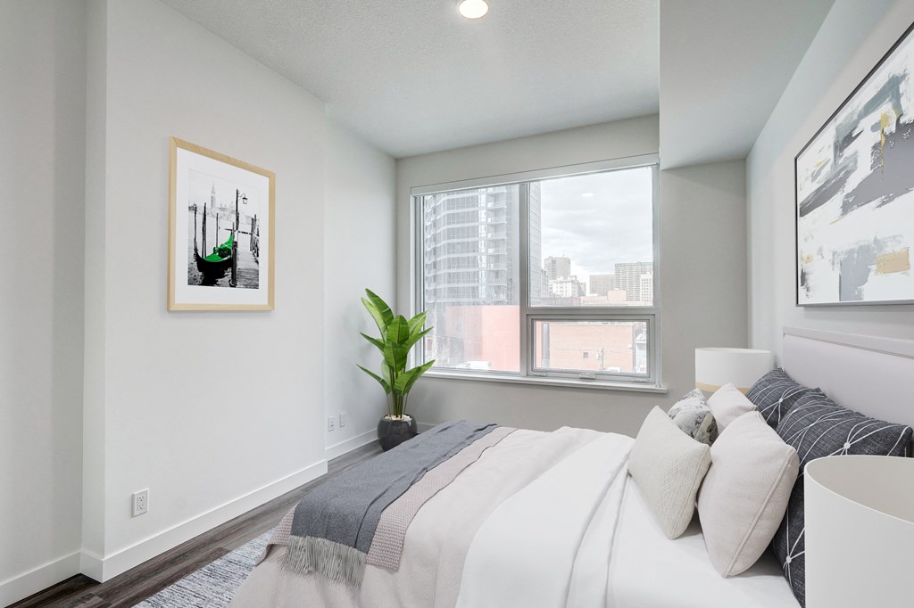 Comfortable Bedroom With Large Window at BLVD Beltline, Calgary, AB, T2G 2K4