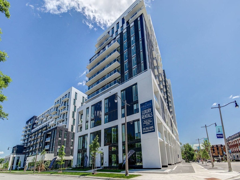 a view of a building on a city street  at The Village, Oakville, ON