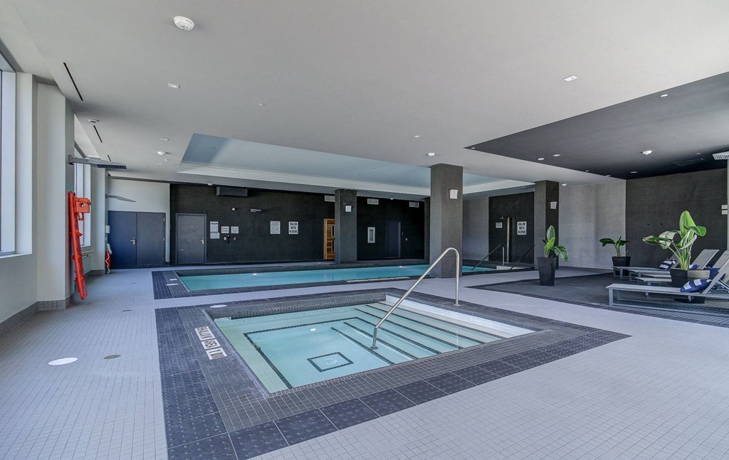 a swimming pool in the lobby of a hotel