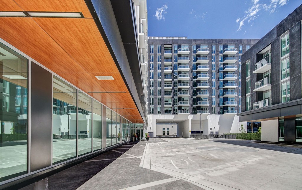 a view of a building from the outside of an apartment building