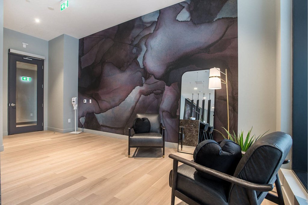 a large wall mural in a lobby of a building