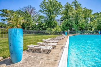Heritage Park Apartments pool loungers 2023