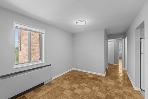 A room with a window and wooden flooring.at Kensington House, Maryland