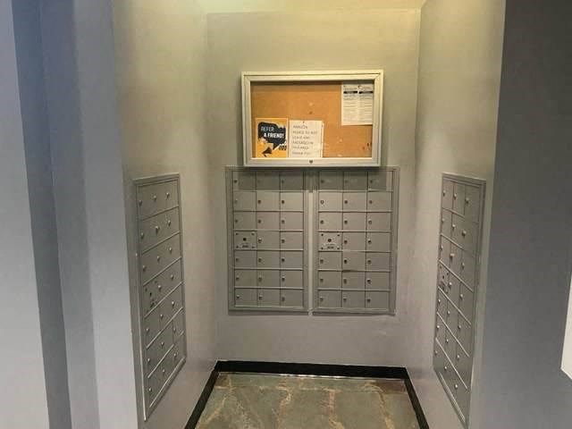 a bunch of mailboxes that are in a room