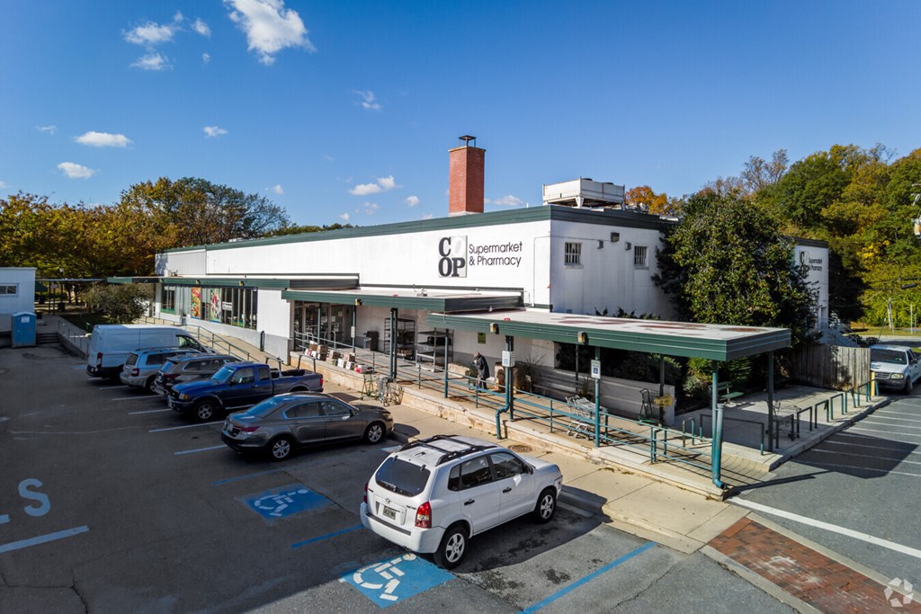 A CVS Pharmacy is shown with a parking lot in front.at Greenbelt Properties, Greenbelt, 20770