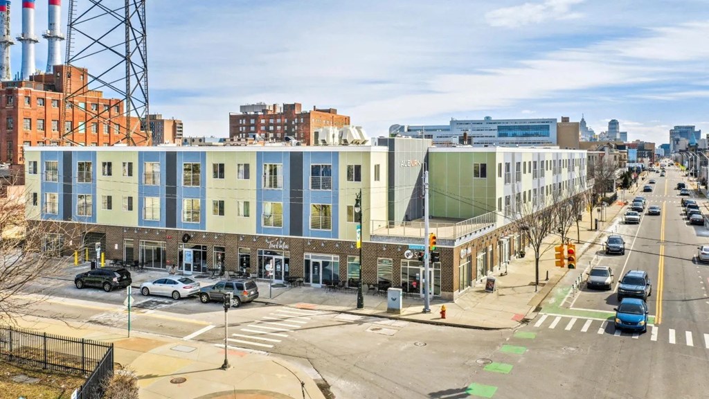 a row of buildings on a city street