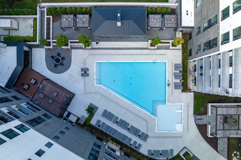 an overhead view of a swimming pool in the middle of a building