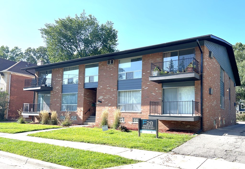a brick apartment building with balconies