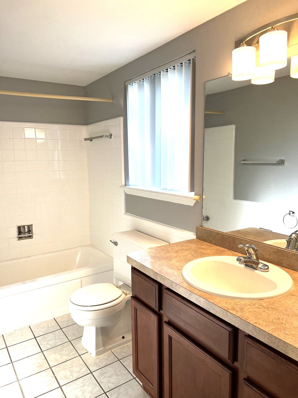 a bathroom with a sink toilet and bathtub